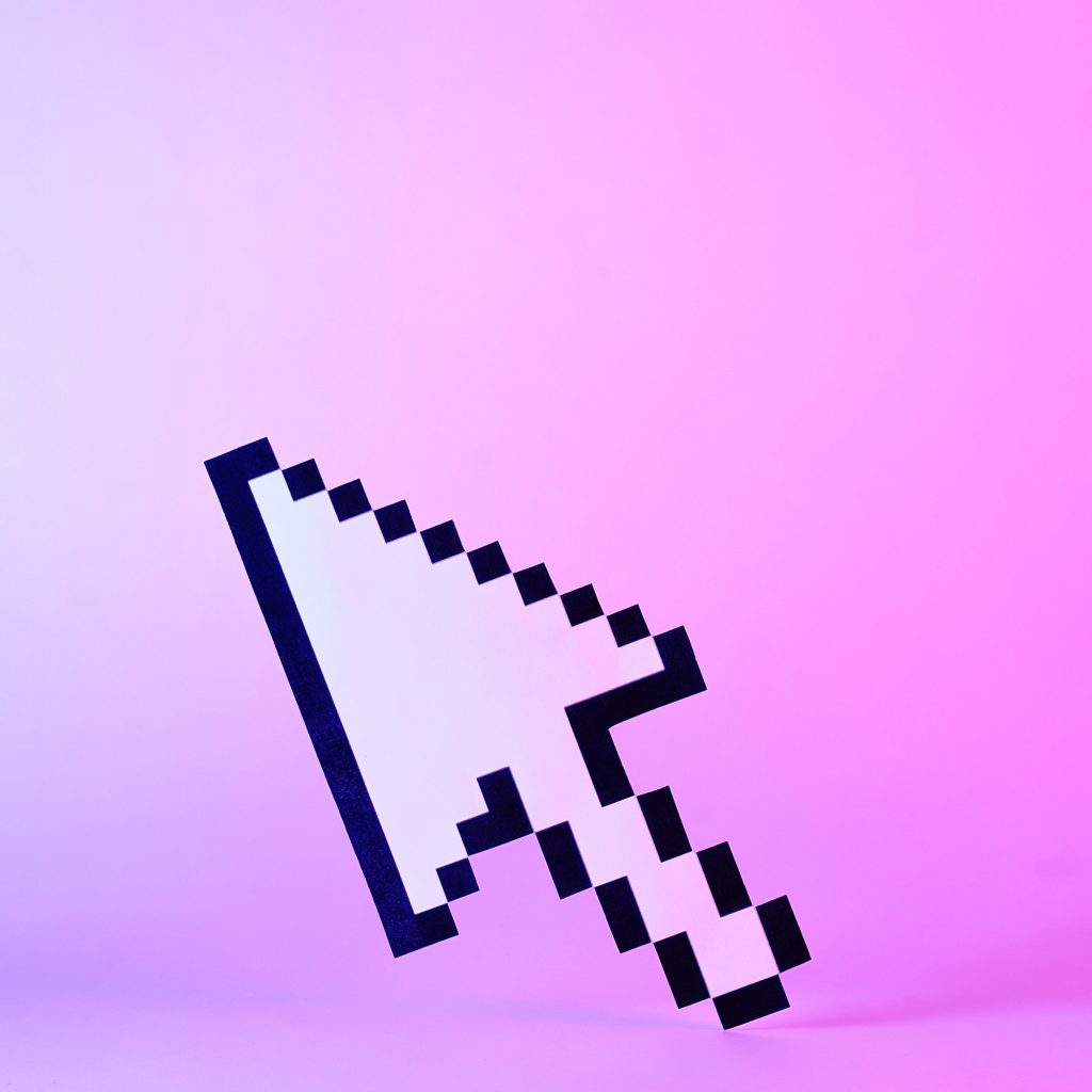Digital pointer or arrow on a purple background