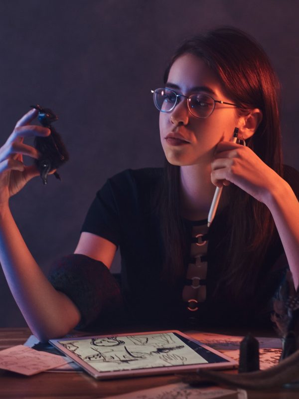 Portrait of cute designer girl at workshop