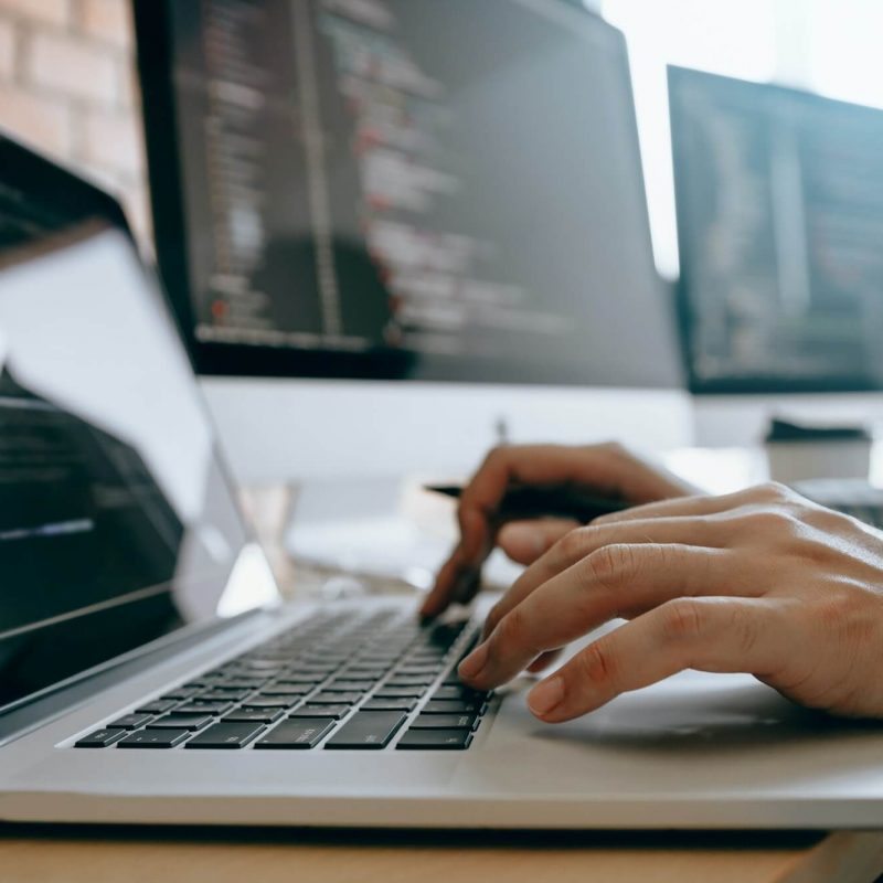 contemporary-website-developer-man-typing-and-writing-code-for-program-website