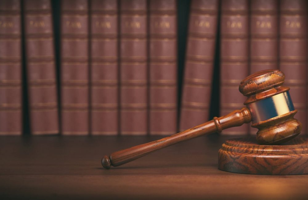 gavel-on-the-background-of-vintage-lawyer-books-concept-of-law