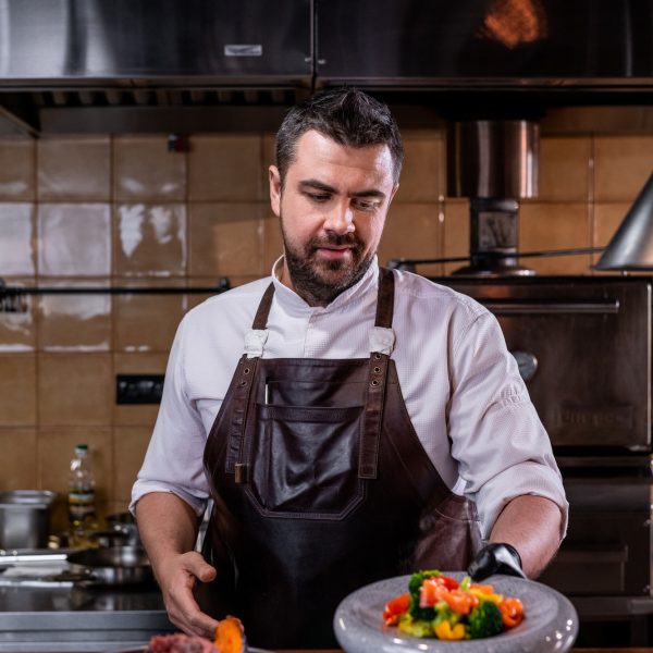 Chef serving dishes