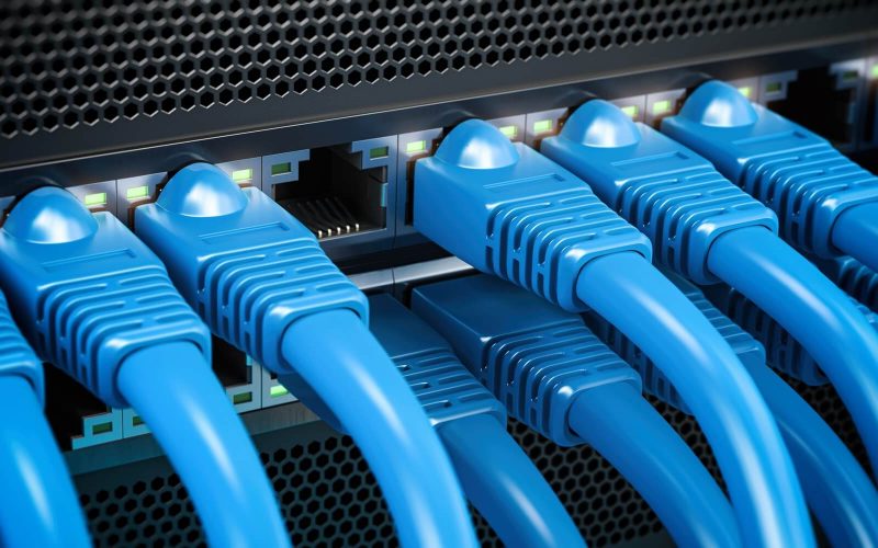 network-lan-internet-cables-connected-in-network-switches-server-in-data-center-