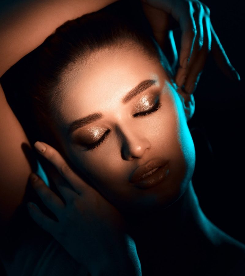 woman-in-shadow-light-on-eyes-with-beautiful-makeup